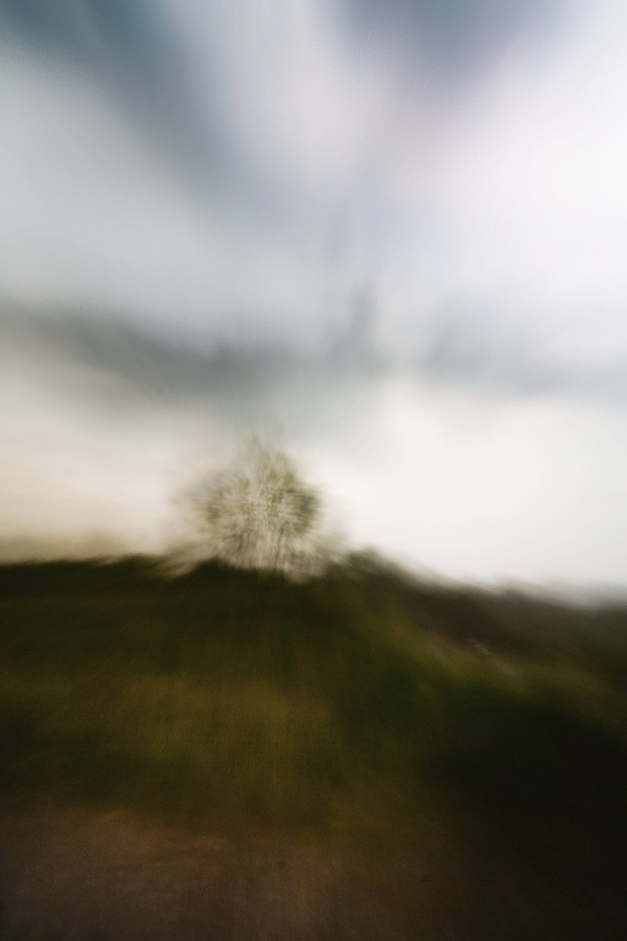 Transient Ridge - This work serves as a visual meditation on transience, rendering a familiar landscape through a lens of rapid motion and soft focus